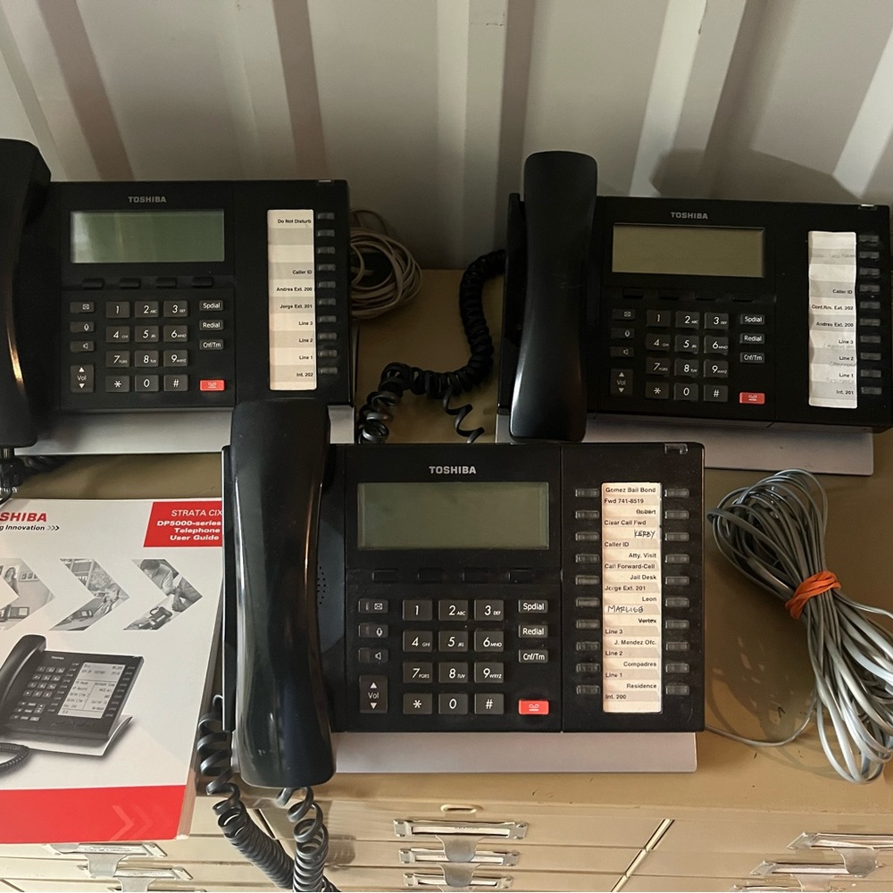 Toshiba Strata Telephone System 3 telephones.